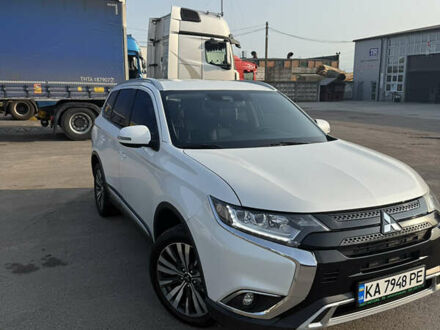 Білий Міцубісі Аутлендер, об'ємом двигуна 2.36 л та пробігом 84 тис. км за 19999 $, фото 1 на Automoto.ua