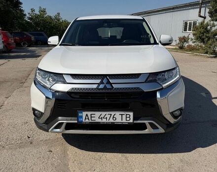 Белый Мицубиси Аутлендер, объемом двигателя 2 л и пробегом 175 тыс. км за 20500 $, фото 1 на Automoto.ua