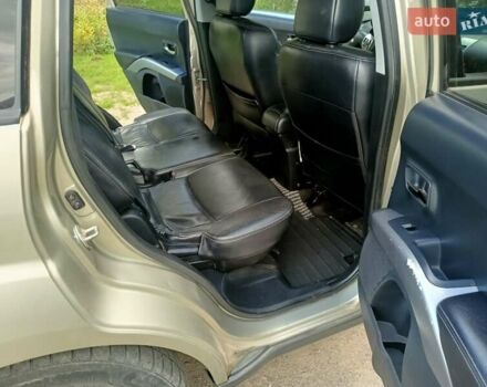 Бежевий Міцубісі Аутлендер, об'ємом двигуна 1.97 л та пробігом 274 тис. км за 7800 $, фото 13 на Automoto.ua