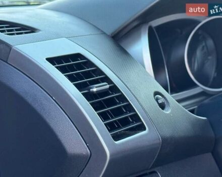 Бежевий Міцубісі Аутлендер, об'ємом двигуна 2.36 л та пробігом 200 тис. км за 8820 $, фото 21 на Automoto.ua