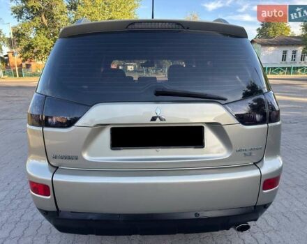 Бежевий Міцубісі Аутлендер, об'ємом двигуна 2.36 л та пробігом 200 тис. км за 8820 $, фото 16 на Automoto.ua