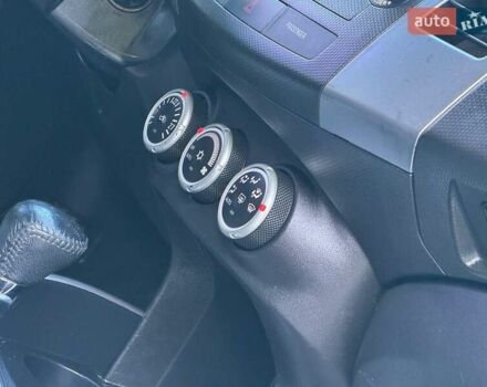 Бежевий Міцубісі Аутлендер, об'ємом двигуна 2.36 л та пробігом 200 тис. км за 8820 $, фото 26 на Automoto.ua