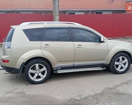 Бежевий Міцубісі Аутлендер, об'ємом двигуна 2.36 л та пробігом 282 тис. км за 7800 $, фото 5 на Automoto.ua