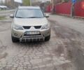 Бежевий Міцубісі Аутлендер, об'ємом двигуна 2.36 л та пробігом 282 тис. км за 7800 $, фото 1 на Automoto.ua