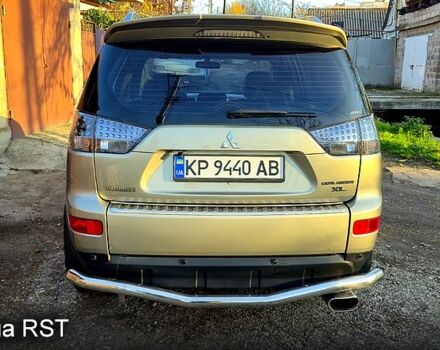 Бежевий Міцубісі Аутлендер, об'ємом двигуна 3 л та пробігом 295 тис. км за 9600 $, фото 3 на Automoto.ua