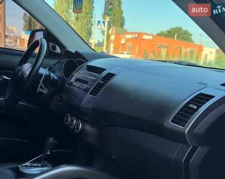 Бежевий Міцубісі Аутлендер, об'ємом двигуна 2.36 л та пробігом 200 тис. км за 8820 $, фото 24 на Automoto.ua