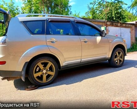 Бежевый Мицубиси Аутлендер, объемом двигателя 2.4 л и пробегом 204 тыс. км за 8500 $, фото 7 на Automoto.ua