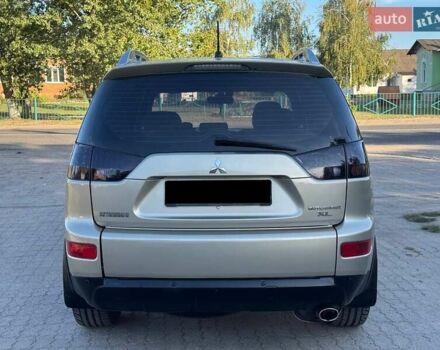 Бежевий Міцубісі Аутлендер, об'ємом двигуна 2.36 л та пробігом 200 тис. км за 8820 $, фото 11 на Automoto.ua