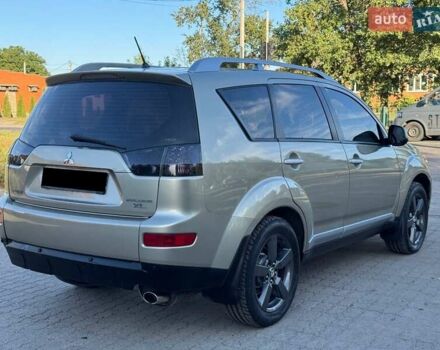 Бежевий Міцубісі Аутлендер, об'ємом двигуна 2.36 л та пробігом 200 тис. км за 8820 $, фото 12 на Automoto.ua