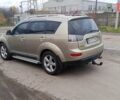 Бежевий Міцубісі Аутлендер, об'ємом двигуна 2.36 л та пробігом 282 тис. км за 7800 $, фото 3 на Automoto.ua