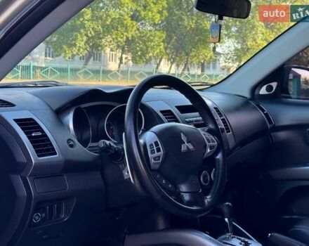 Бежевий Міцубісі Аутлендер, об'ємом двигуна 2.36 л та пробігом 200 тис. км за 8820 $, фото 18 на Automoto.ua