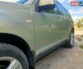 Бежевий Міцубісі Аутлендер, об'ємом двигуна 1.97 л та пробігом 274 тис. км за 7800 $, фото 2 на Automoto.ua