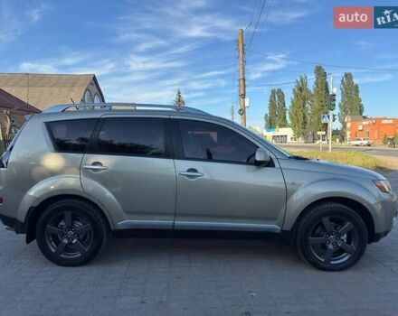Бежевий Міцубісі Аутлендер, об'ємом двигуна 2.36 л та пробігом 200 тис. км за 8820 $, фото 8 на Automoto.ua