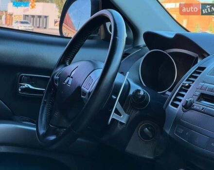 Бежевий Міцубісі Аутлендер, об'ємом двигуна 2.36 л та пробігом 200 тис. км за 8820 $, фото 25 на Automoto.ua