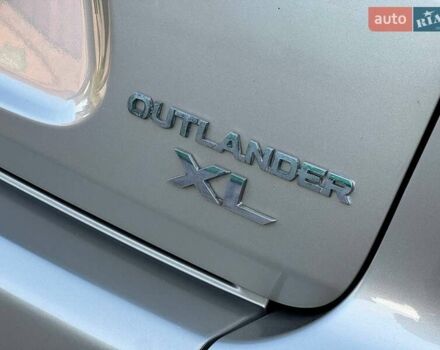 Бежевий Міцубісі Аутлендер, об'ємом двигуна 2.36 л та пробігом 200 тис. км за 8820 $, фото 14 на Automoto.ua