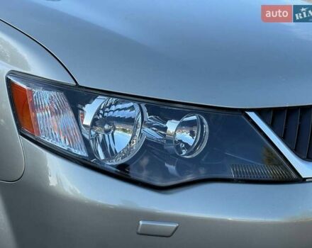 Бежевий Міцубісі Аутлендер, об'ємом двигуна 2.36 л та пробігом 200 тис. км за 8820 $, фото 5 на Automoto.ua