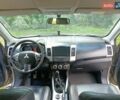 Бежевий Міцубісі Аутлендер, об'ємом двигуна 1.97 л та пробігом 274 тис. км за 7800 $, фото 16 на Automoto.ua