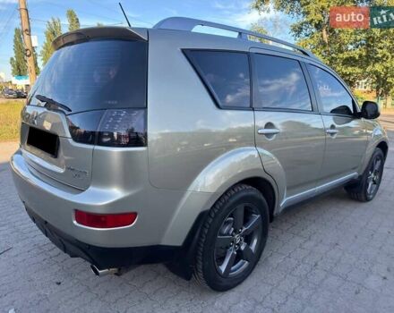 Бежевий Міцубісі Аутлендер, об'ємом двигуна 2.36 л та пробігом 200 тис. км за 8820 $, фото 17 на Automoto.ua