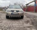 Бежевий Міцубісі Аутлендер, об'ємом двигуна 2.36 л та пробігом 282 тис. км за 7800 $, фото 6 на Automoto.ua