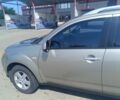 Бежевий Міцубісі Аутлендер, об'ємом двигуна 2.4 л та пробігом 257 тис. км за 8700 $, фото 5 на Automoto.ua