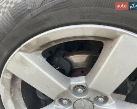 Бежевый Мицубиси Аутлендер, объемом двигателя 3 л и пробегом 176 тыс. км за 11000 $, фото 12 на Automoto.ua