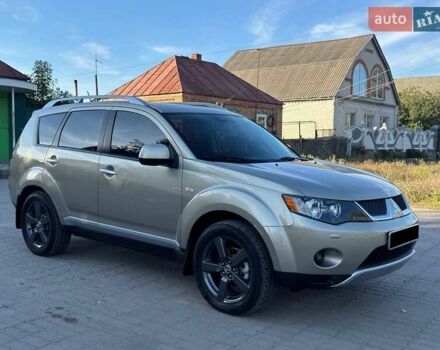 Бежевий Міцубісі Аутлендер, об'ємом двигуна 2.36 л та пробігом 200 тис. км за 8820 $, фото 2 на Automoto.ua