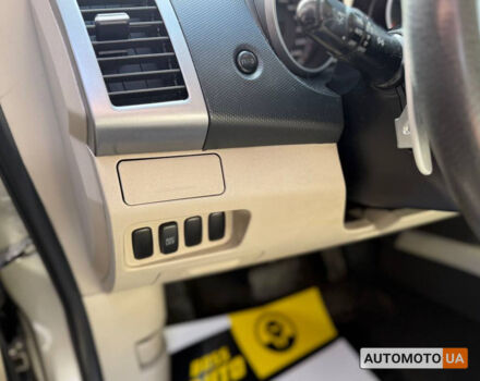 Бежевий Міцубісі Аутлендер, об'ємом двигуна 2.4 л та пробігом 195 тис. км за 8500 $, фото 11 на Automoto.ua