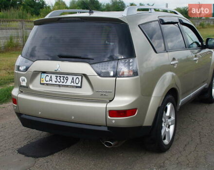 Бежевий Міцубісі Аутлендер, об'ємом двигуна 2.36 л та пробігом 207 тис. км за 10800 $, фото 15 на Automoto.ua