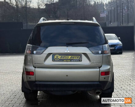 Бежевий Міцубісі Аутлендер, об'ємом двигуна 2.4 л та пробігом 195 тис. км за 8500 $, фото 4 на Automoto.ua