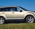 Бежевий Міцубісі Аутлендер, об'ємом двигуна 2.36 л та пробігом 256 тис. км за 8000 $, фото 4 на Automoto.ua