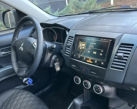 Бежевый Мицубиси Аутлендер, объемом двигателя 2.4 л и пробегом 226 тыс. км за 8999 $, фото 20 на Automoto.ua