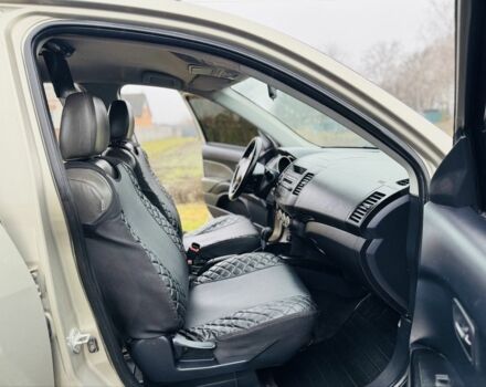 Бежевый Мицубиси Аутлендер, объемом двигателя 2.4 л и пробегом 107 тыс. км за 9900 $, фото 8 на Automoto.ua