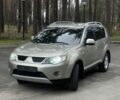 Бежевый Мицубиси Аутлендер, объемом двигателя 3 л и пробегом 240 тыс. км за 8200 $, фото 1 на Automoto.ua