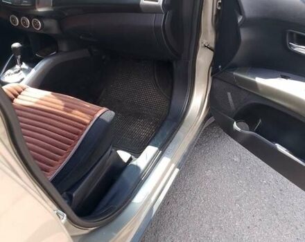 Бежевый Мицубиси Аутлендер, объемом двигателя 2.4 л и пробегом 156 тыс. км за 9219 $, фото 5 на Automoto.ua