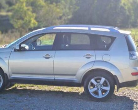 Бежевий Міцубісі Аутлендер, об'ємом двигуна 2.36 л та пробігом 256 тис. км за 8000 $, фото 9 на Automoto.ua