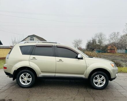 Бежевый Мицубиси Аутлендер, объемом двигателя 2.4 л и пробегом 107 тыс. км за 9900 $, фото 1 на Automoto.ua