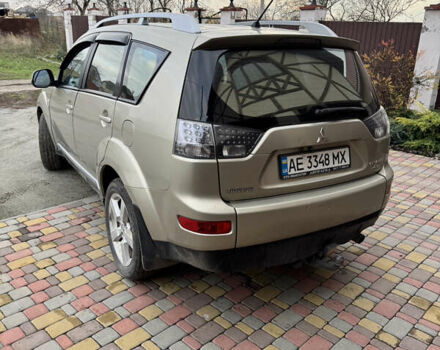 Бежевий Міцубісі Аутлендер, об'ємом двигуна 2.4 л та пробігом 301 тис. км за 6100 $, фото 2 на Automoto.ua