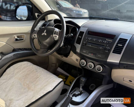 Бежевий Міцубісі Аутлендер, об'ємом двигуна 2.4 л та пробігом 195 тис. км за 8500 $, фото 17 на Automoto.ua
