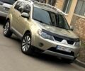 Бежевий Міцубісі Аутлендер, об'ємом двигуна 2.4 л та пробігом 400 тис. км за 9450 $, фото 1 на Automoto.ua