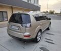 Бежевий Міцубісі Аутлендер, об'ємом двигуна 3 л та пробігом 266 тис. км за 8500 $, фото 6 на Automoto.ua