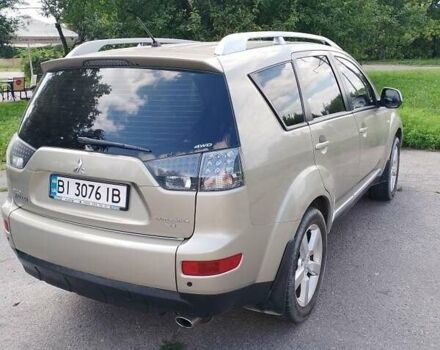 Бежевый Мицубиси Аутлендер, объемом двигателя 2.4 л и пробегом 156 тыс. км за 9219 $, фото 2 на Automoto.ua