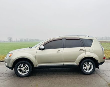 Бежевый Мицубиси Аутлендер, объемом двигателя 2.4 л и пробегом 107 тыс. км за 9900 $, фото 4 на Automoto.ua