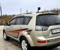 Бежевий Міцубісі Аутлендер, об'ємом двигуна 2.4 л та пробігом 270 тис. км за 8500 $, фото 4 на Automoto.ua