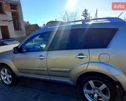 Бежевий Міцубісі Аутлендер, об'ємом двигуна 2.36 л та пробігом 220 тис. км за 9500 $, фото 4 на Automoto.ua