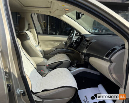 Бежевий Міцубісі Аутлендер, об'ємом двигуна 2.4 л та пробігом 195 тис. км за 8500 $, фото 19 на Automoto.ua