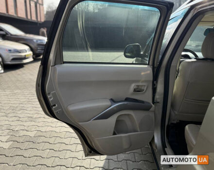 Бежевий Міцубісі Аутлендер, об'ємом двигуна 2.4 л та пробігом 195 тис. км за 8500 $, фото 21 на Automoto.ua