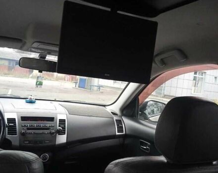 Бежевий Міцубісі Аутлендер, об'ємом двигуна 2.4 л та пробігом 290 тис. км за 6800 $, фото 6 на Automoto.ua