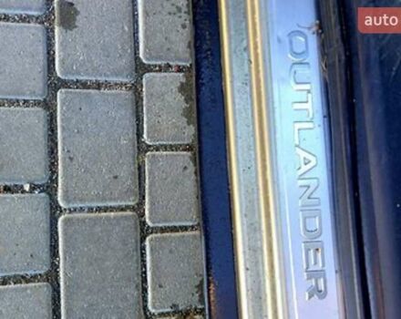 Бежевий Міцубісі Аутлендер, об'ємом двигуна 2.36 л та пробігом 220 тис. км за 9500 $, фото 7 на Automoto.ua