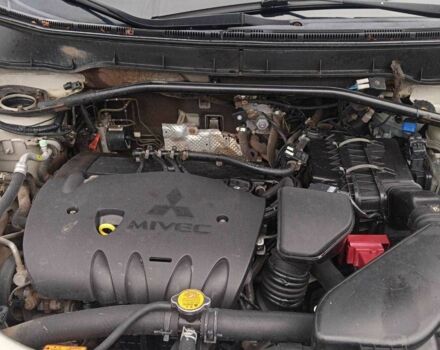 Бежевий Міцубісі Аутлендер, об'ємом двигуна 2.4 л та пробігом 290 тис. км за 6800 $, фото 8 на Automoto.ua