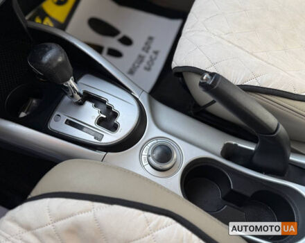 Бежевий Міцубісі Аутлендер, об'ємом двигуна 2.4 л та пробігом 195 тис. км за 8500 $, фото 15 на Automoto.ua